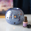 Quemador de Aceite y Cera Morado Iridiscente con Estrellas